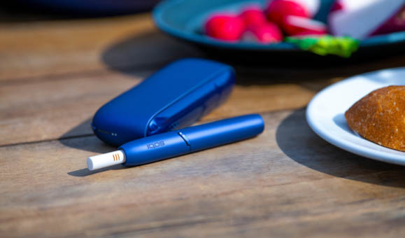 Man Holding IQOS 3 White