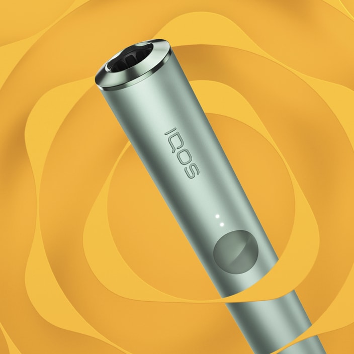 A Jade Green IQOS ILUMA Holder.