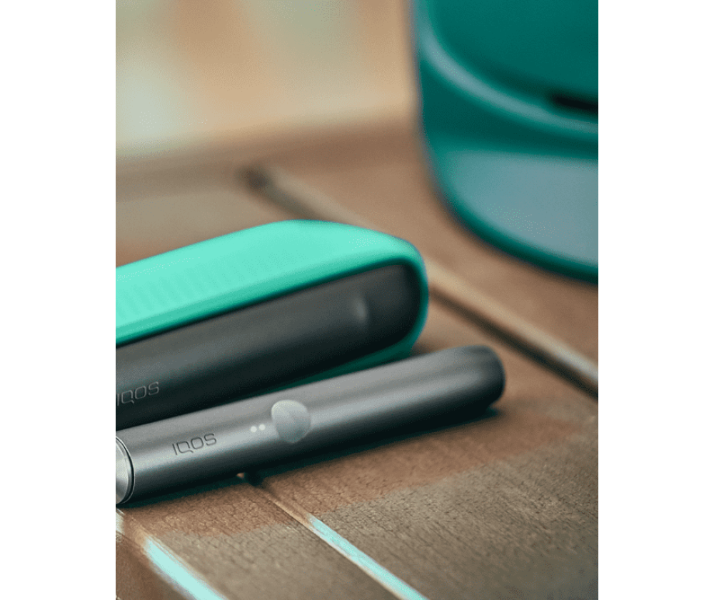 IQOS Iluma device with Tinted Teal color sleeve